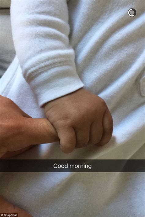 Kim Kardashian Shares Photo Of Onesie Clad Son Saint Squeezing Her Finger Daily Mail Online