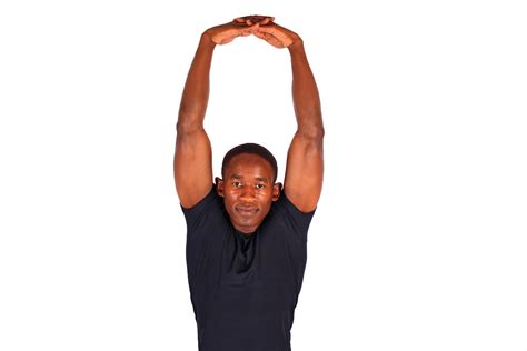 Muscular Male Doing Shoulder Stretch