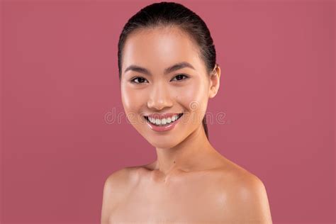 Portrait Of Attractive Naked Korean Woman Posing On Purple Stock Photo