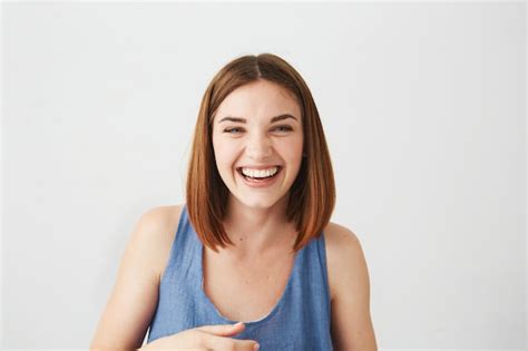 Free Photo Portrait Of Cheerful Happy Young Beautiful Girl Laughing