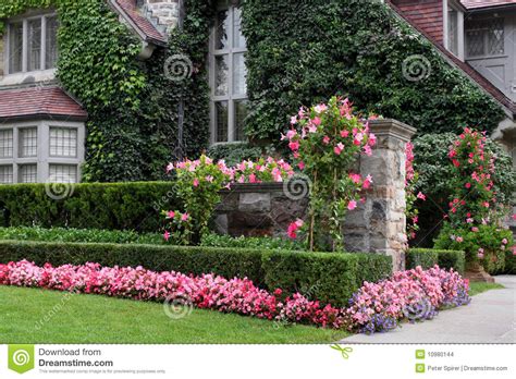 Featuring same day flower delivery to saskatoon. House with pink flowers stock photo. Image of wealthy ...