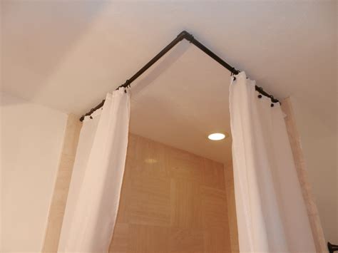 Hanging curtains from a ceiling can be a relatively simple process. Ceiling Mounted Shower Curtain - HomesFeed