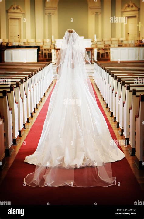 Bride Walking Down Church Aisle Stock Photo Alamy