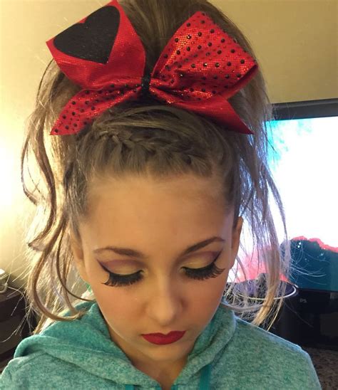 Poof cheer hairstyles poof hair is perhaps the most common and widely known and popular hairstyle for cheerleaders. Perfect fall gameday cheer hair and makeup | Cheer hair ...