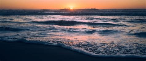 Download Wallpaper 2560x1080 Ocean Sunset Beach Waves Dusk Dual