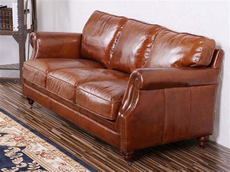 3 seater sofa in vintage brown leather. Riveted Antique Leather Sofa 3S ; Antique Leather Sofa set; riveted leather sofa set