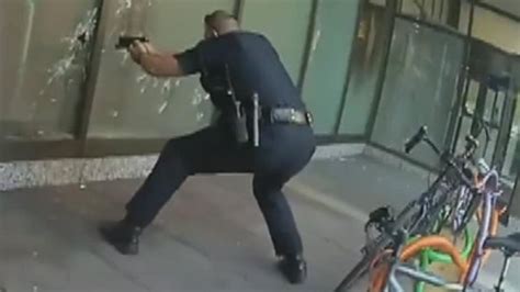 cincinnati police release bodycam footage of cop firing through window gunning down mass