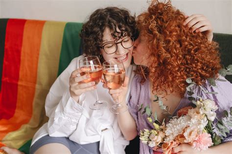 Woman Kissing Another Woman While · Free Stock Photo