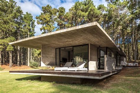 Concrete Summer Home Brings Raw Modernism To The Forest
