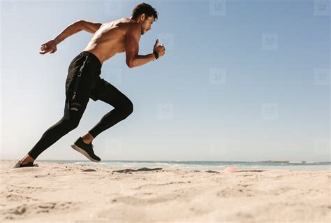 Man Running On The Beach Stock Photo 146518 Youworkforthem
