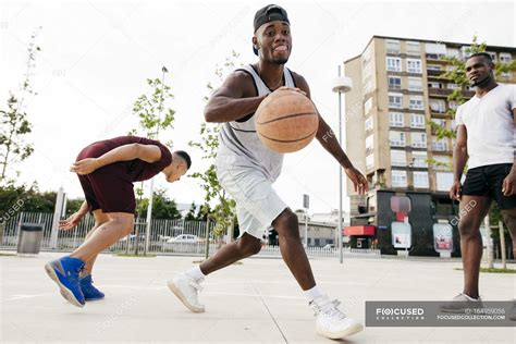 Men Playing Basketball — Back View Young Stock Photo 164959056
