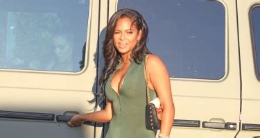 Braless Christina Milian Displays Her Cleavage In Deeply Plunging Catsuit Bootymotiontv