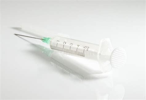 Small Syringe With A Sharp Beveled Needle Used To Inject Medications
