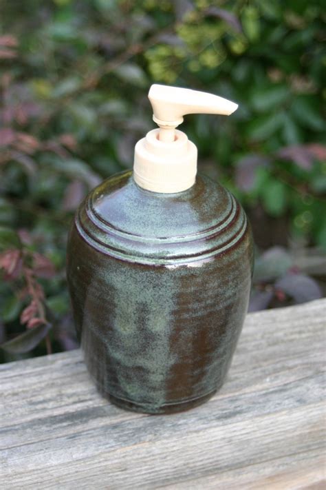 Pottery Soap Dispenser Green Glaze NC Pottery by ... This is our new ceramic soap dispenser pump in the blue mint green glaze.it holds 14.5 oz.