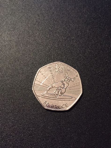 Great savings free delivery / collection on many items. 2011 Olympics 50P Coin - Wrestling | 50p coin, Coins ...