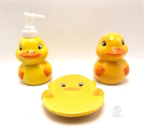Comes as a bathroom set with 12 free hooks in the package. Yellow Duck 3 Piece Bathroom Set Toothbrush Holder Soap ...