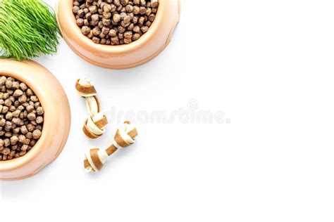 Dry Pet Dog Food In Bowl On White Background Top View Mock Up Stock