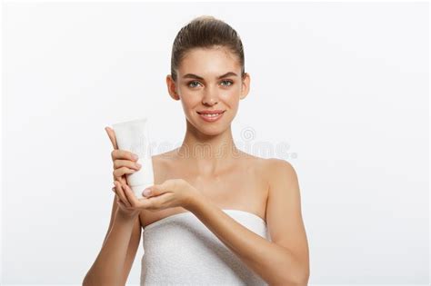 beauty youth skin care concept beautiful caucasian woman face portrait holding and presenting