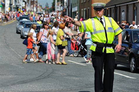 Scottish Traffic Police Officer Directing Traffic Stock Photo