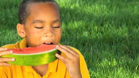 African American Child Eating Water Melon Stock Footage Video 1639711