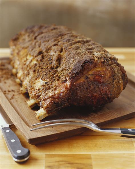 Rub evenly all over the meat and place the meat in a shallow roasting pan, bone side down, fat side up. Beef Prime Rib Roast Recipe with Red Wine Marinade