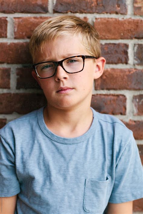 Portrait Of A Serious Boy In Glasses By Stocksy Contributor Kelly
