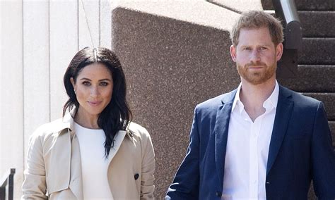 Prince harry, duke of sussex kisses his wife meghan, duchess of sussex as they leave from st. Prince Harry's DIFFICULT decision: royal must LEAVE Meghan ...