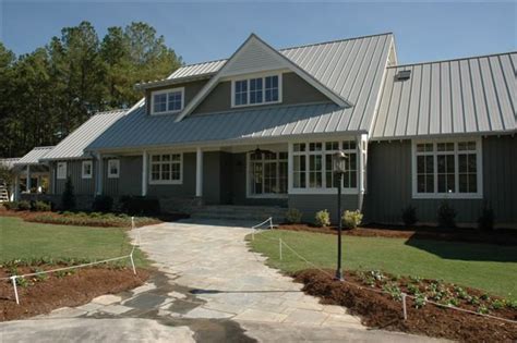To find the best gray exterior paint for your home, consider the surrounding landscape and nearby architecture. Driftwood Gray Siding Paint What Colors Go With | The Expert