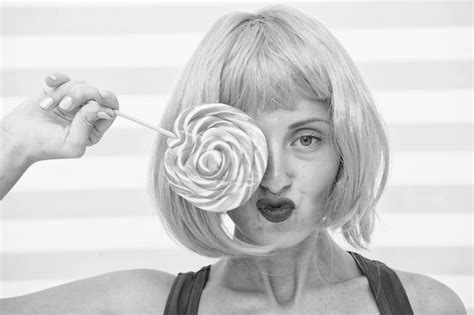 Premium Photo Crazy Girl Holding And Playing With Lollipop Dieting