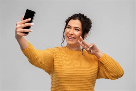 Smiling Young Woman Taking Selfie By Smartphone Stock Image Image Of