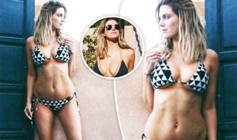 Ashley James Flaunts Major Underboob As Her Ample Assets Spill Out Of Plunging Bikini Top