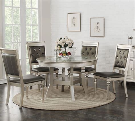 This pretty chair features velvety smooth upholstery on its back and seat cushions to comfort and pamper guests while they enjoy their meals. Stella Silver Round Dining Table Set | Round Dining Room ...