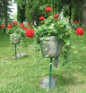 The urn goes in the center. Rose Floral Cemetery Urn Service