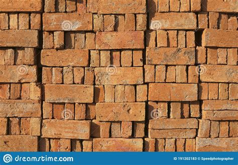 Bricks For Construction Are Lined Up In A Row Texture Background Stock