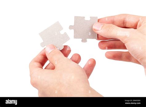 Hands Putting Together Connecting Two Matching Blank Jigsaw Puzzle