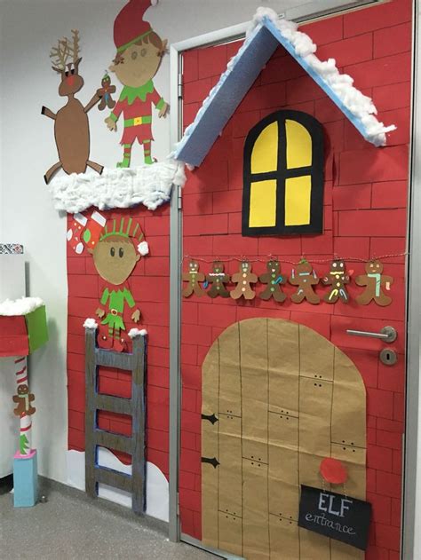 An Office Decorated For Christmas With Decorations On The Door