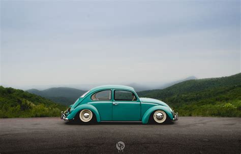 2224x1668 Resolution Green Volkswagen Beetle Coupe Under Gray Sky Hd