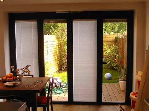 Most doors don't have enough depth, so you'll have to install the window treatment on the wall above. Sliding Door Shades and Their Functions | Window ...