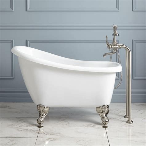 A portable bathtub that has distinct feet at the bottom. Four Foot Clawfoot Tub - Bathtub Designs
