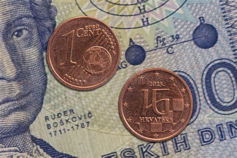 Closeup Of Two Croatian Euro Coins On A Cash Bill Stock Photo Image