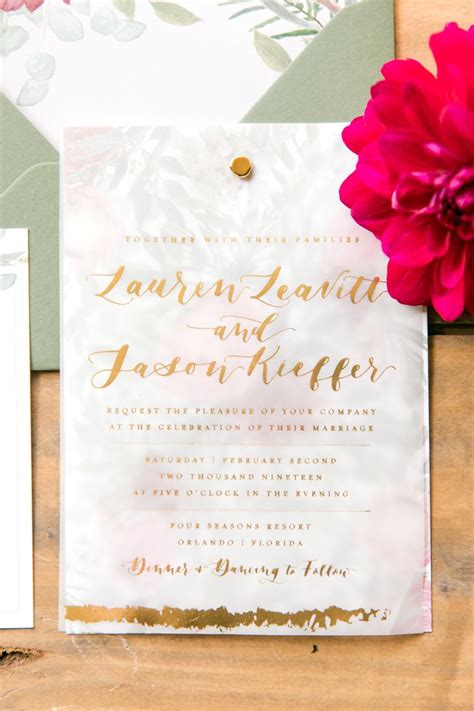 custom wedding stationery with vellum and gold foil watercolor florals and real greenery