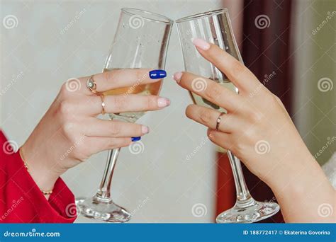Clinking Glasses Of Champagne In Hands Of Two Women Stock Image Image Of Clinking Alcoholic