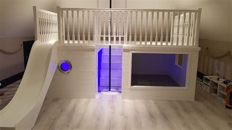 This is a little too tall for a small child. Playhouse Bed Blue | Bed with slide, Bunk bed with slide ...