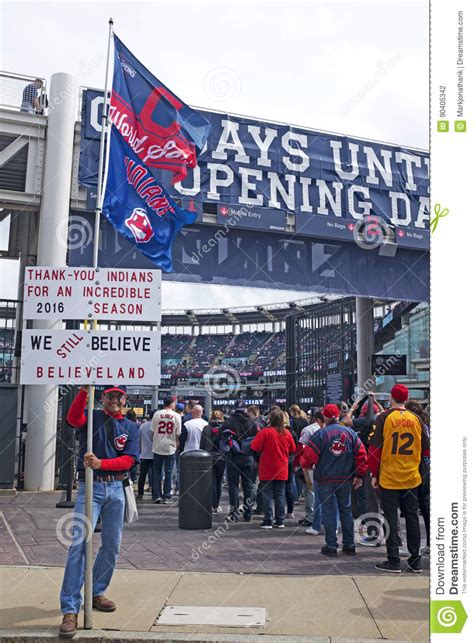 Man Holds Signs At Progressive Field On Opening Day In Cleveland Ohio