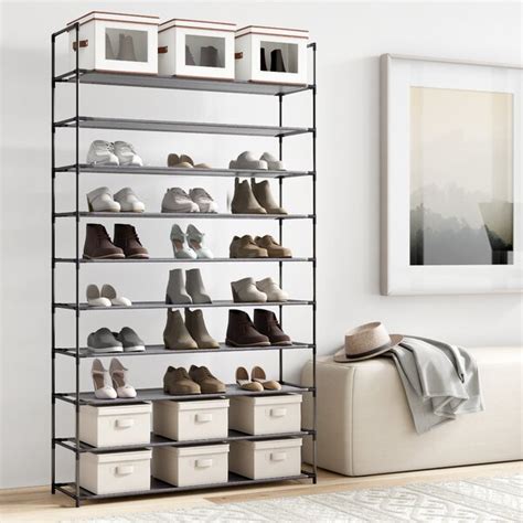 Made of solid wood and sturdy construction, this shoe cabinet is equipped with three compartments on each of the fo…. Dotted Line 50 Pair Shoe Rack & Reviews | Wayfair