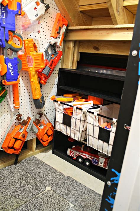 He has big ones, small ones, strange ones, and ones i am not sure how to operate. Easy DIY Nerf gun storage from Thrifty Decor Chick