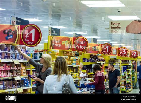 Shoppers And Offer Signs At Tesco Supermarket Uk Stock Photo Alamy