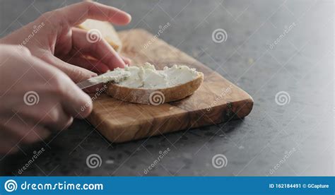 Man Hand Spreading Cream Cheese On Slice Of Ciabatta Stock Image Image Of Cream Rustic