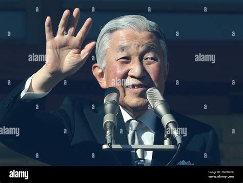 Japan S Emperor Akihito Waves To Well Wishers As He Appears On The Bullet Proofed Balcony Of The
