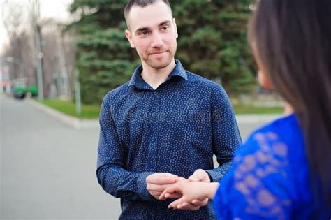 Man Asking His Girlfriend If She Wants To Marry Him Stock Image Image